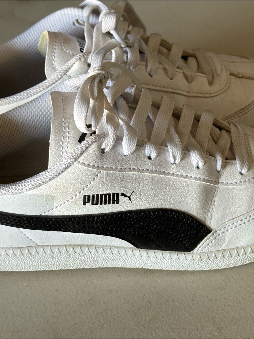 Puma women’s White Sneakers with Black Formstrip